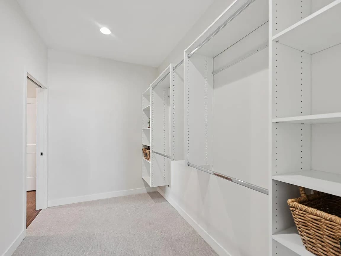Custom home walk-in closet in Buffalo, MN by Nordic Homes